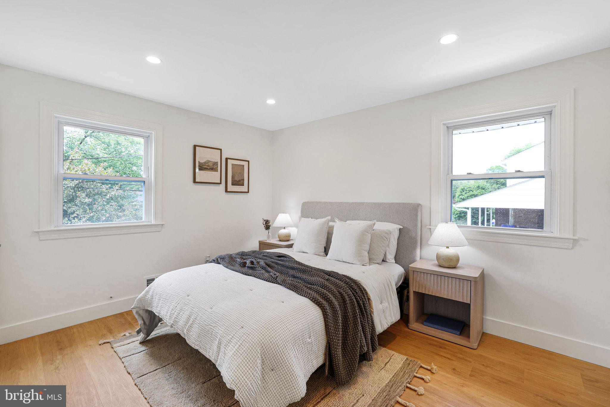 12300 La Plata Street Silver Spring, MD 20904 - Photo 16 of 45 a bedroom with a bed and a window
