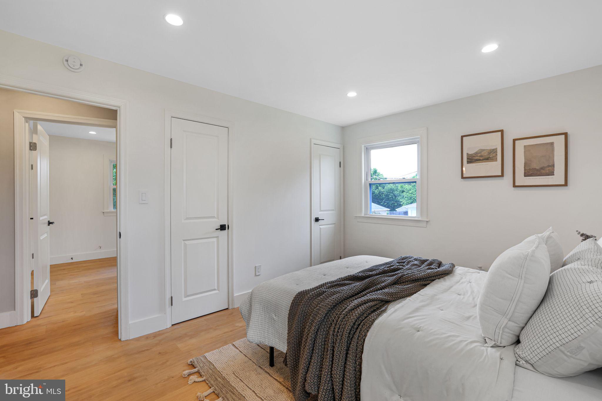 12300 La Plata Street Silver Spring, MD 20904 - Photo 17 of 45 a bedroom with a bed and a window