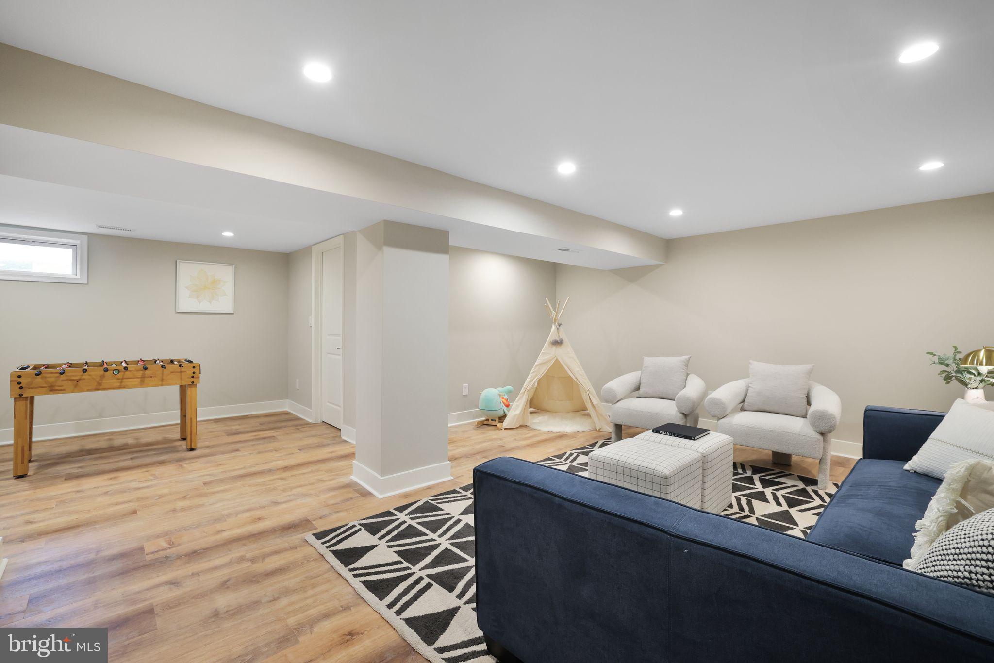 12300 La Plata Street Silver Spring, MD 20904 - Photo 32 of 45 a living room with furniture and a couch
