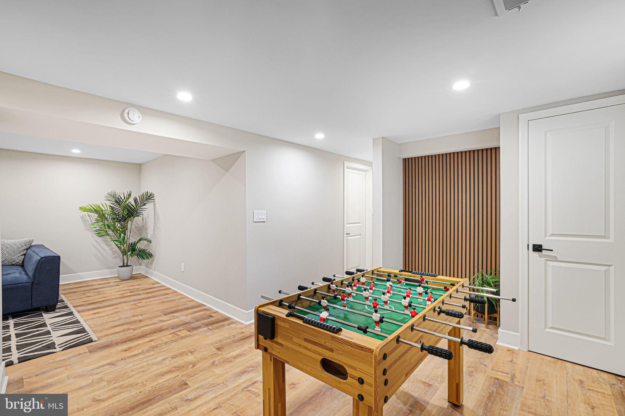 12300 La Plata Street Silver Spring, MD 20904 - Photo 34 of 45 a room with furniture and wooden floor