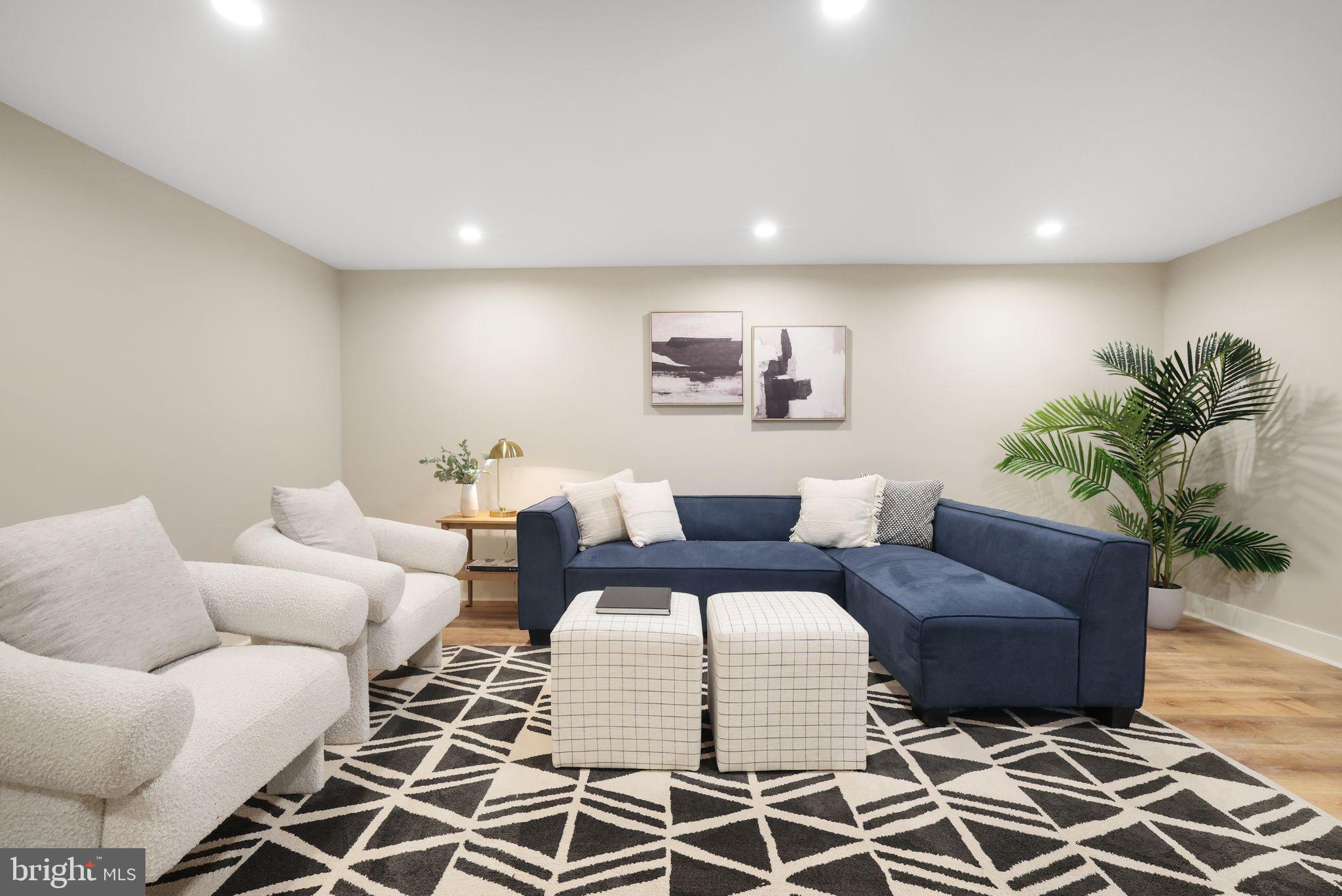 12300 La Plata Street Silver Spring, MD 20904 - Photo 37 of 45 a living room with furniture and a rug