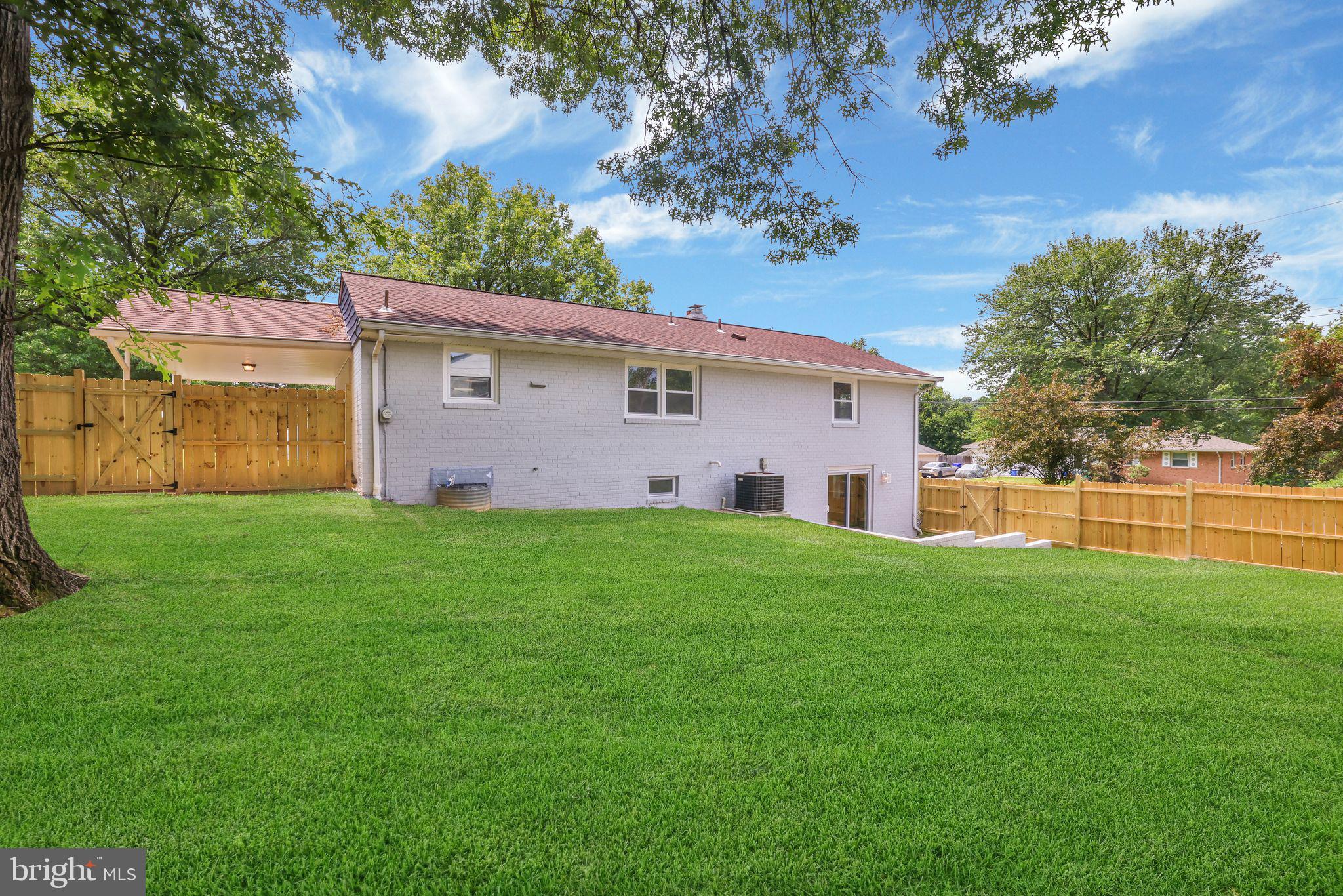 12300 La Plata Street Silver Spring, MD 20904 - Photo 38 of 45 a front view of house with yard and trees