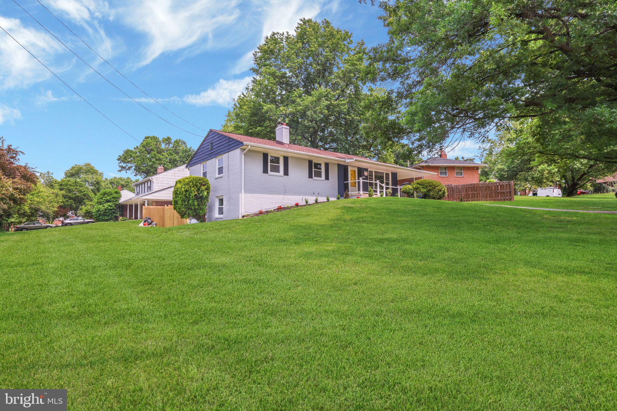 12300 La Plata Street Silver Spring, MD 20904 - Photo 43 of 45 a front view of a house with garden