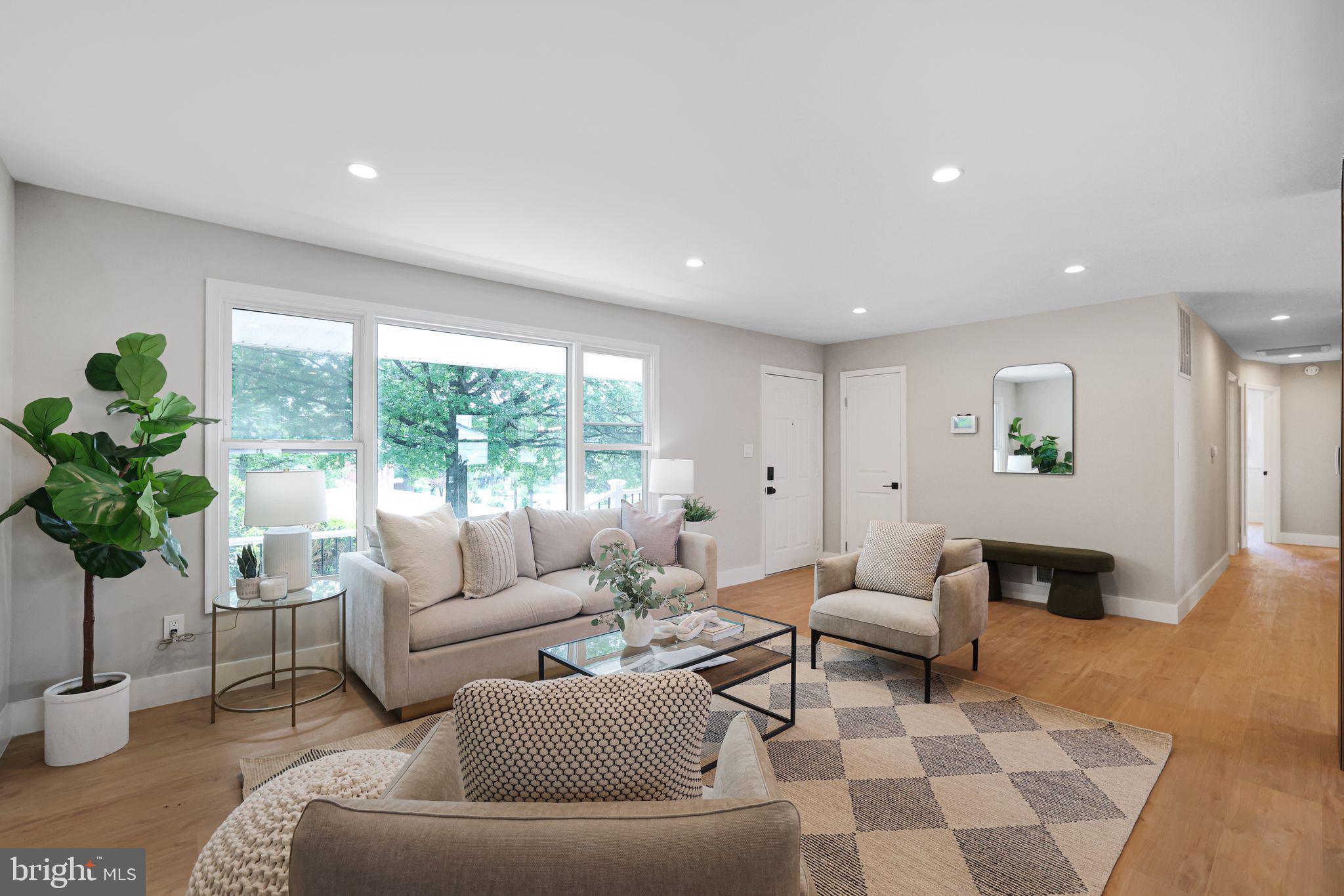 12300 La Plata Street Silver Spring, MD 20904 - Photo 10 of 45 a living room with furniture and a large window