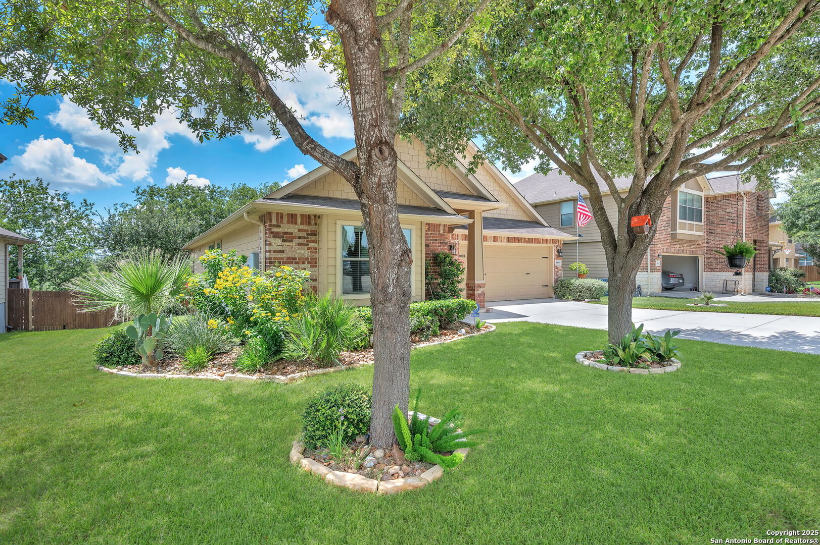 5809 Devonwood Street Schertz, TX 78108 - Photo 4 of 26 a front view of a house with a yard