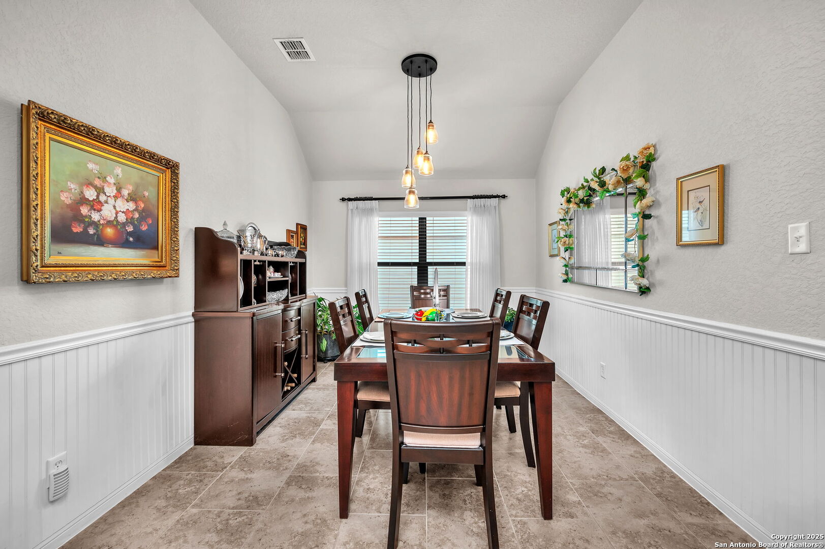 5809 Devonwood Street Schertz, TX 78108 - Photo 10 of 26 a view of a dining room with furniture window and wooden floor