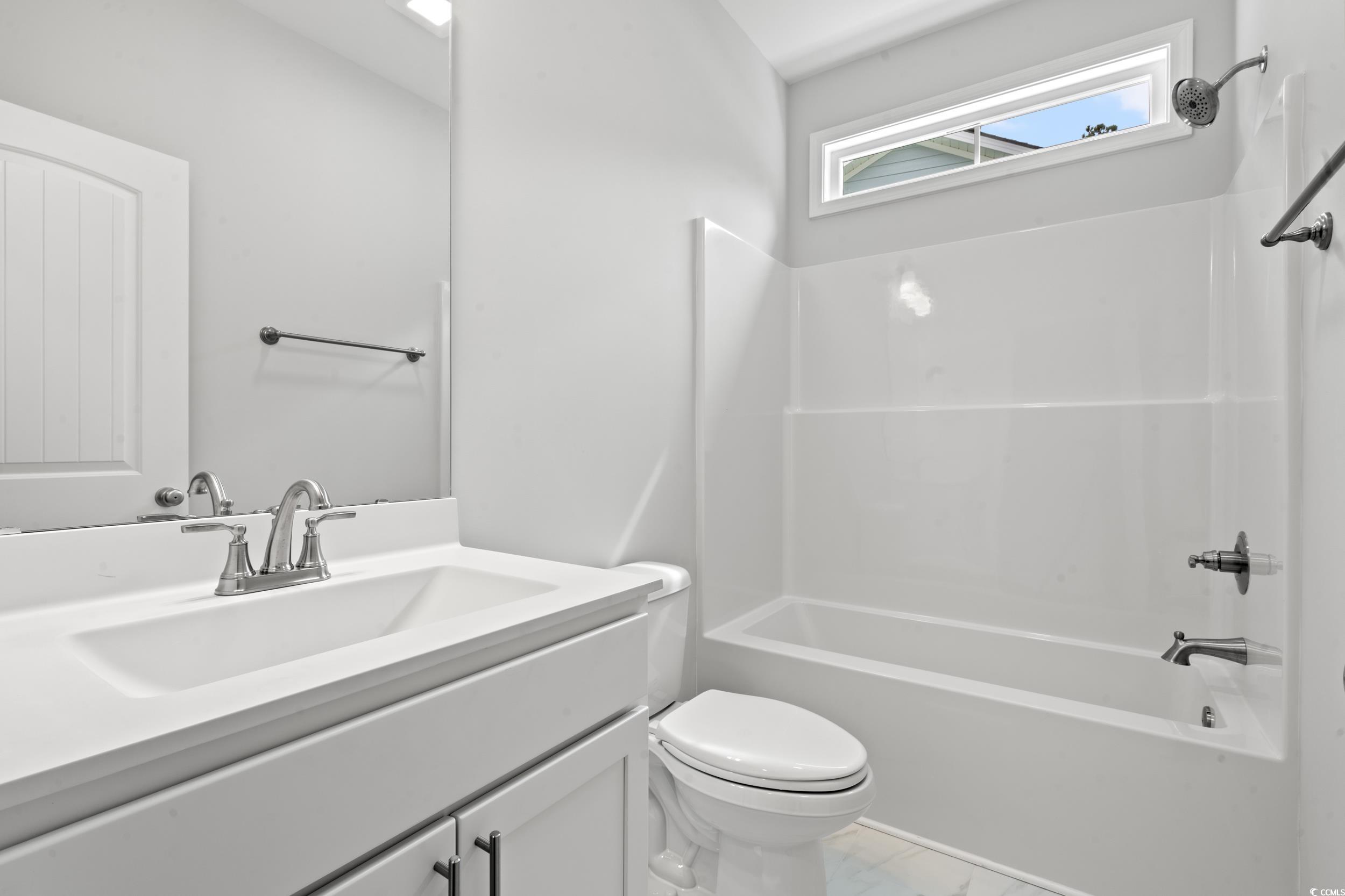 220 Ford Road Pawleys Island, SC 29585 - Photo 11 of 18 Full bathroom with shower / bathtub combination and vanity