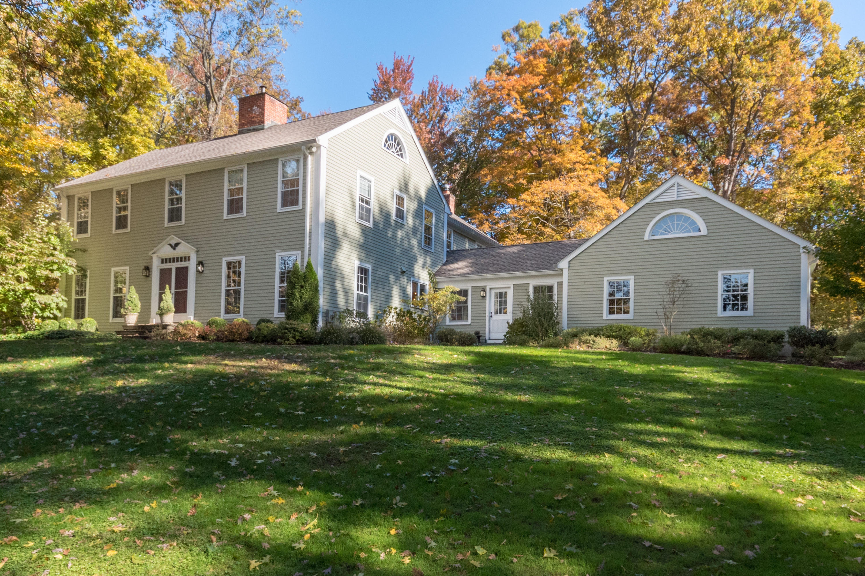 7 Hunt Road Darien, CT 06820 - Photo 1 of 40 a front view of a house with a yard