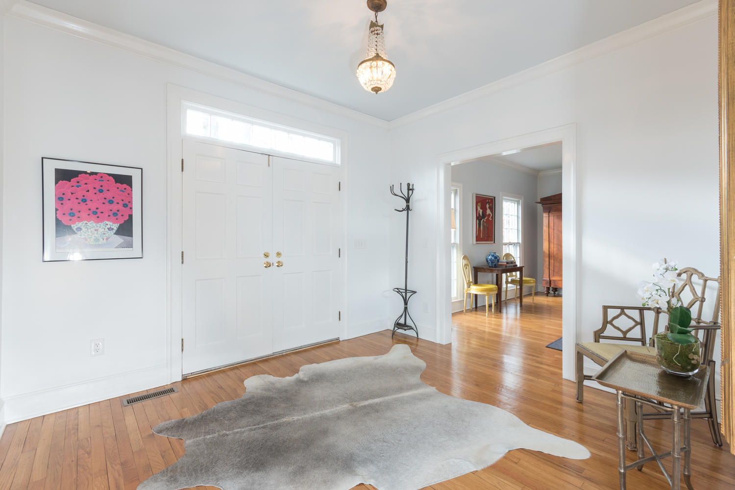 7 Hunt Road Darien, CT 06820 - Photo 2 of 40 a view of livingroom with dining room and wooden floor