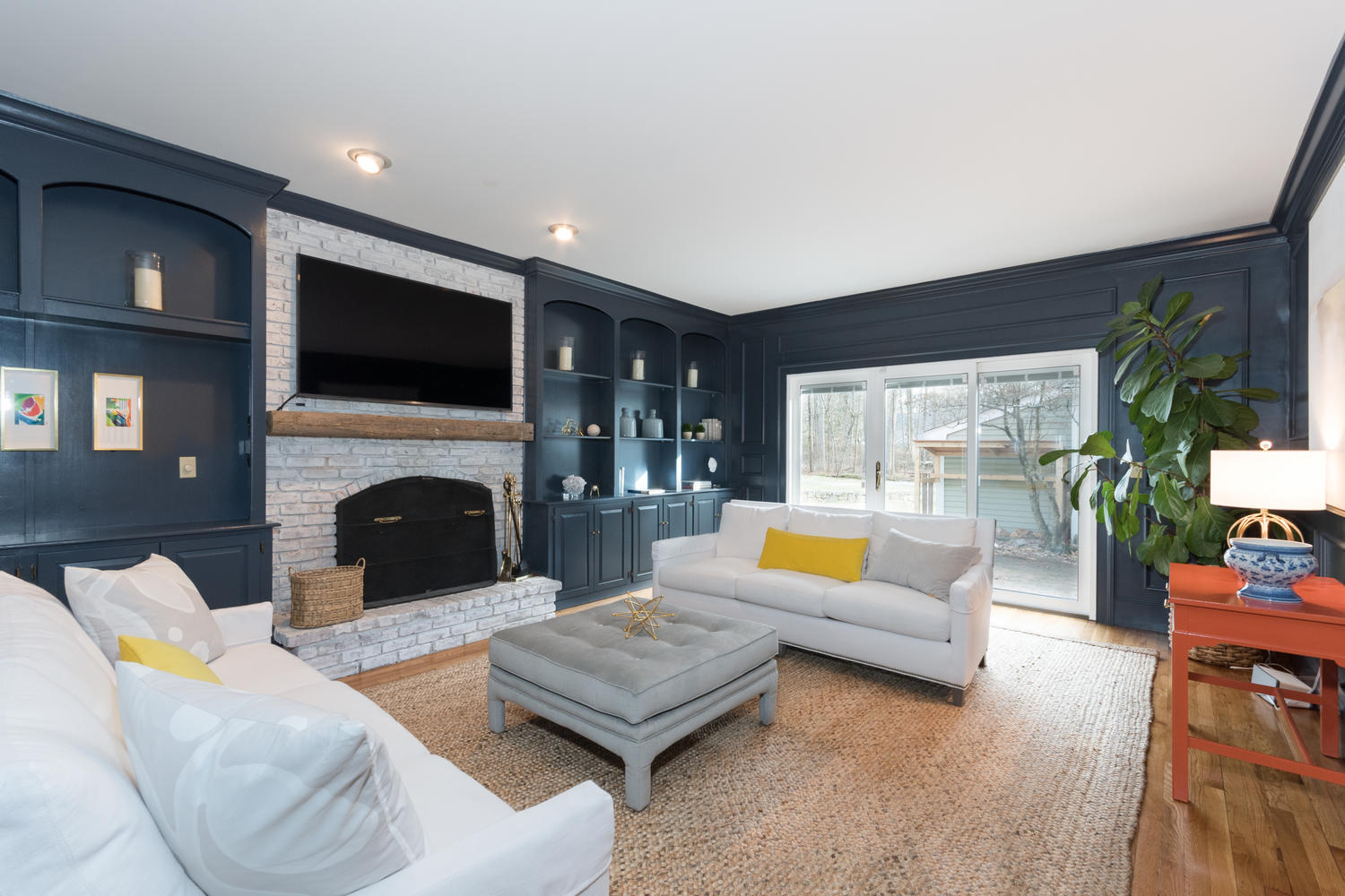 7 Hunt Road Darien, CT 06820 - Photo 12 of 40 a living room with furniture fireplace and flat screen tv