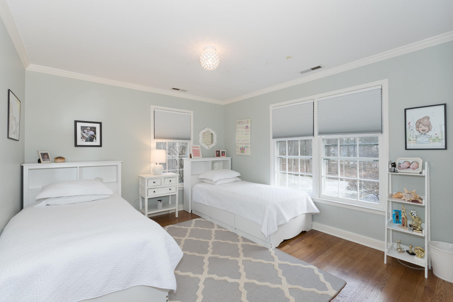 7 Hunt Road Darien, CT 06820 - Photo 27 of 40 a bedroom with two beds and a large window