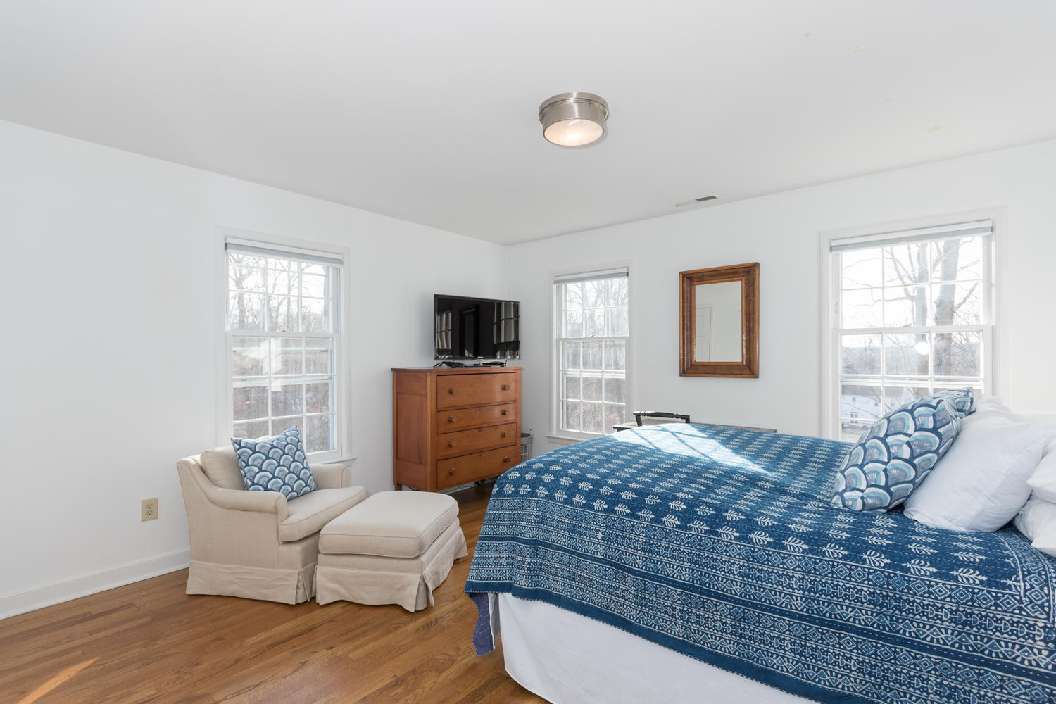 7 Hunt Road Darien, CT 06820 - Photo 30 of 40 a bedroom with a bed and a couch