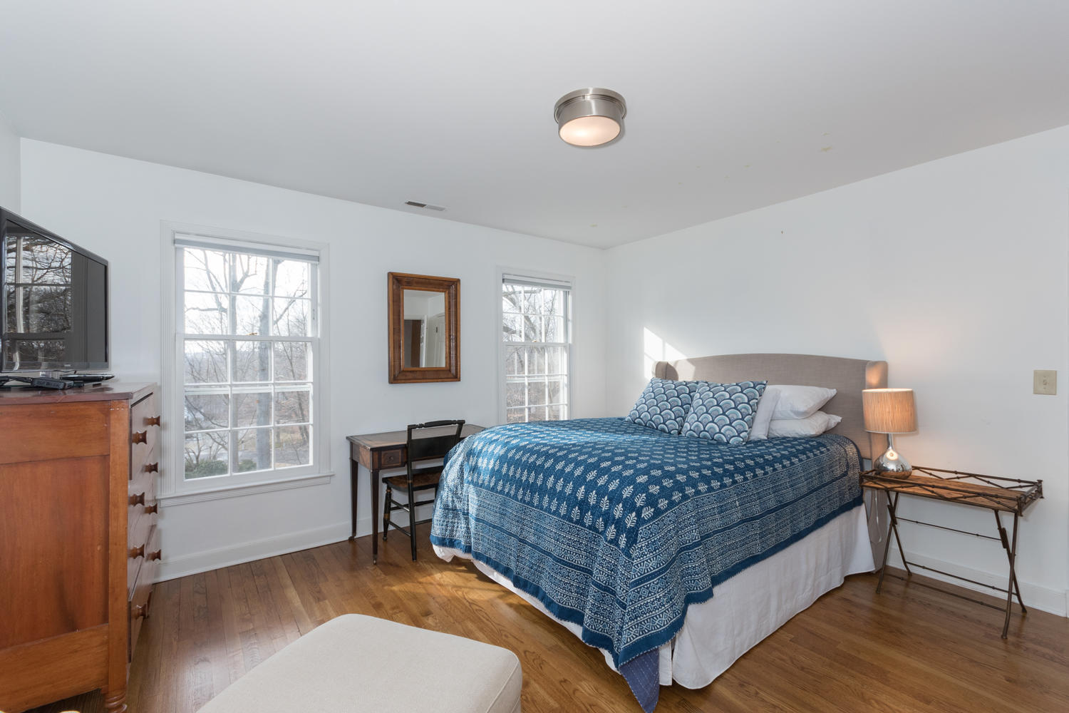 7 Hunt Road Darien, CT 06820 - Photo 31 of 40 a bedroom with a bed and a window