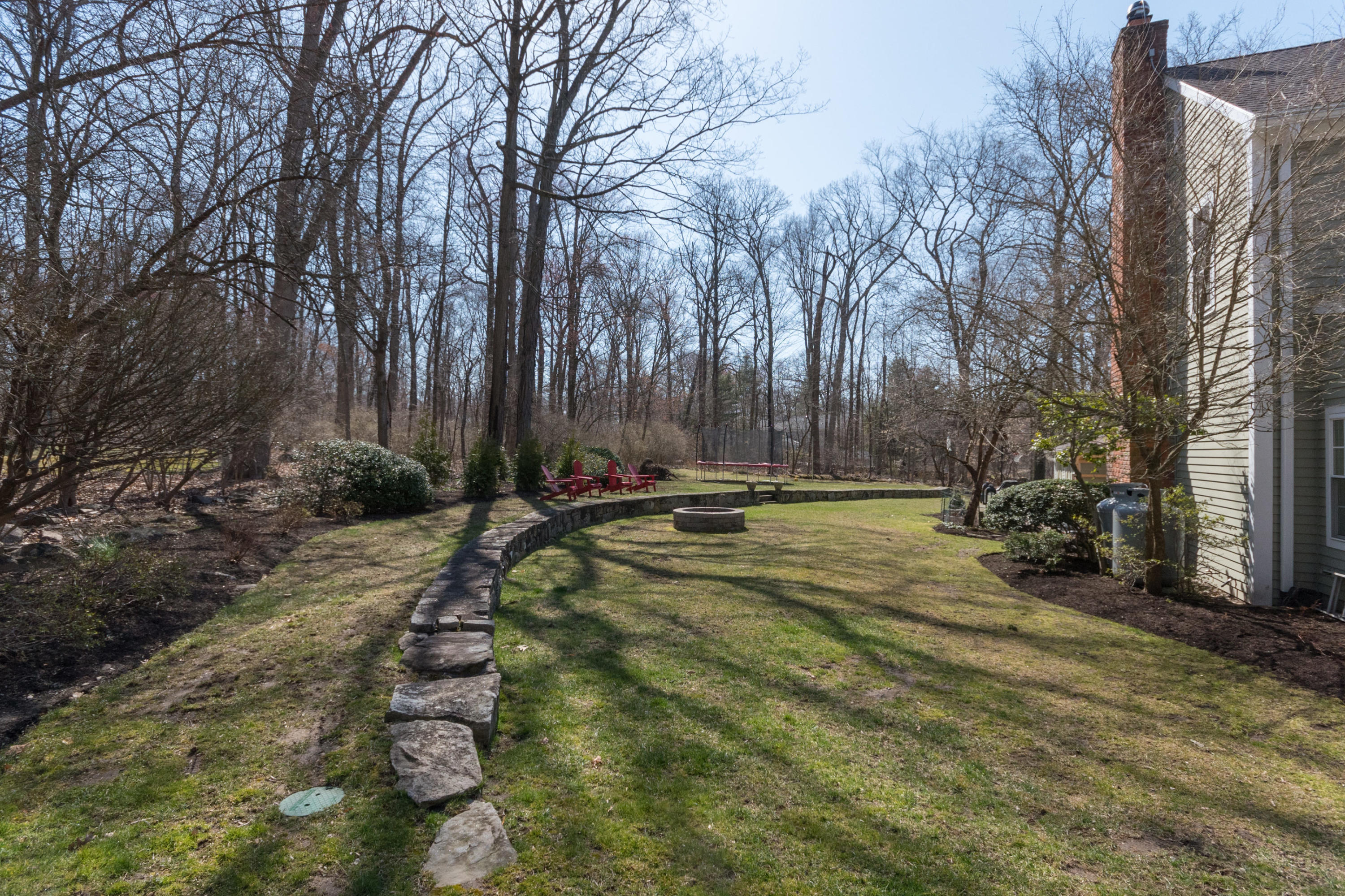 7 Hunt Road Darien, CT 06820 - Photo 36 of 40 a view of a yard with trees