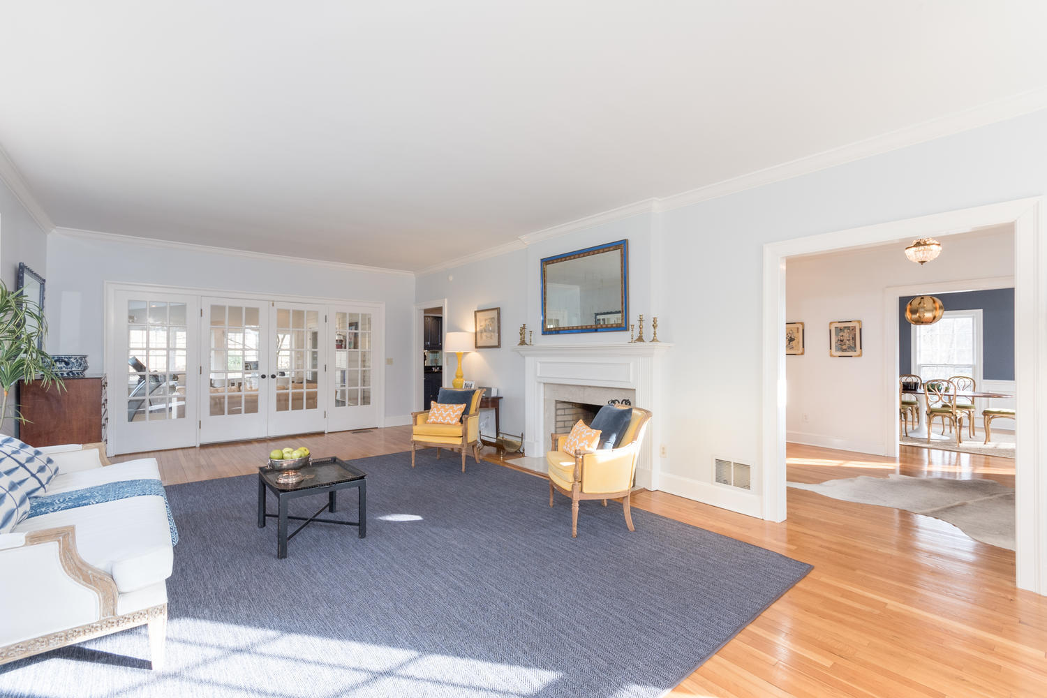 7 Hunt Road Darien, CT 06820 - Photo 5 of 40 a living room with furniture a fireplace and a table
