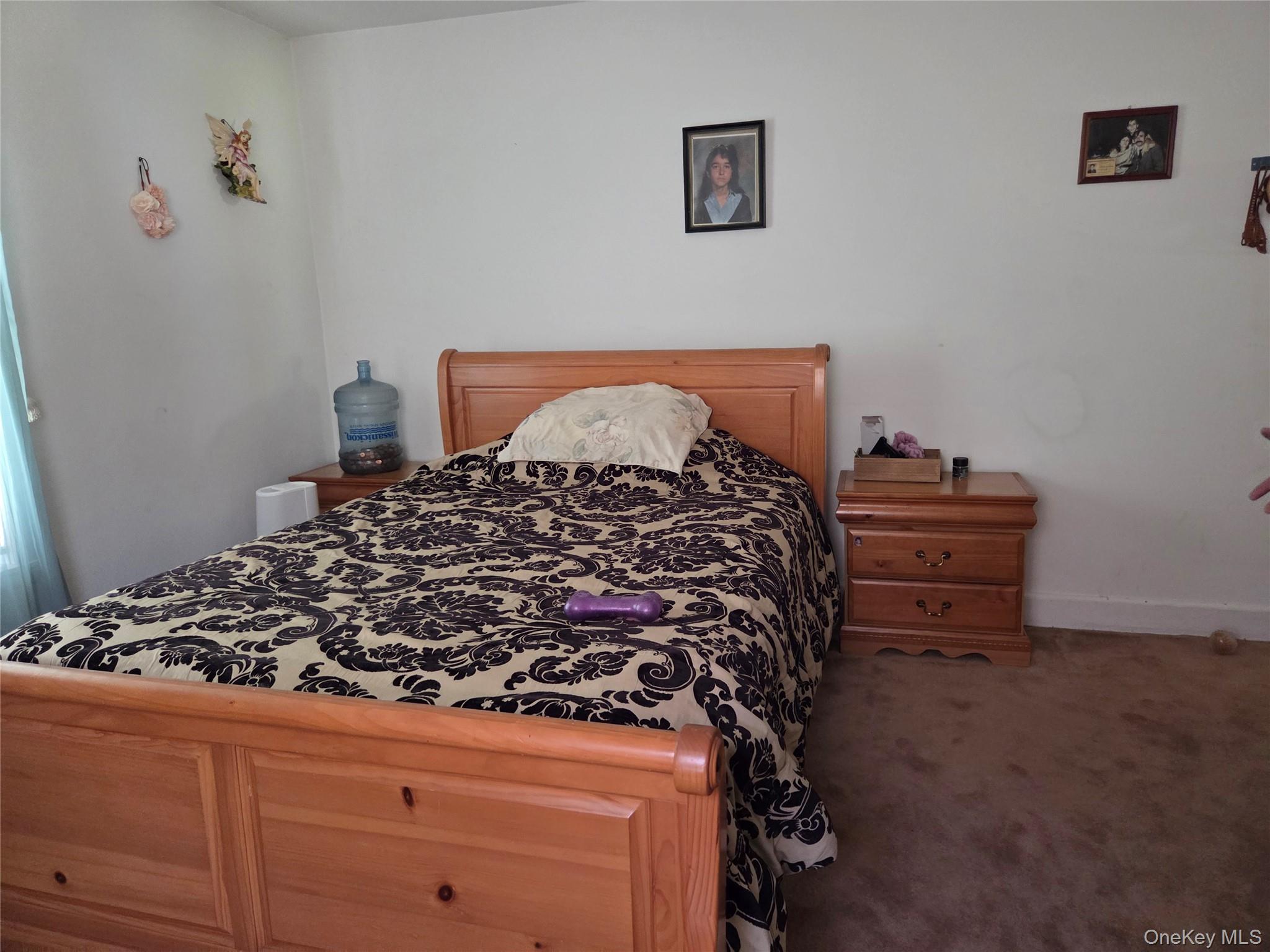 125 Zimmerman Road Loch Sheldrake, NY 12759 - Photo 8 of 43 a bedroom with a bed and a dresser