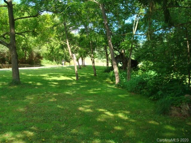 819 Abel Road Canton, NC 28716 - Photo 3 of 4 a view of a big yard with large trees