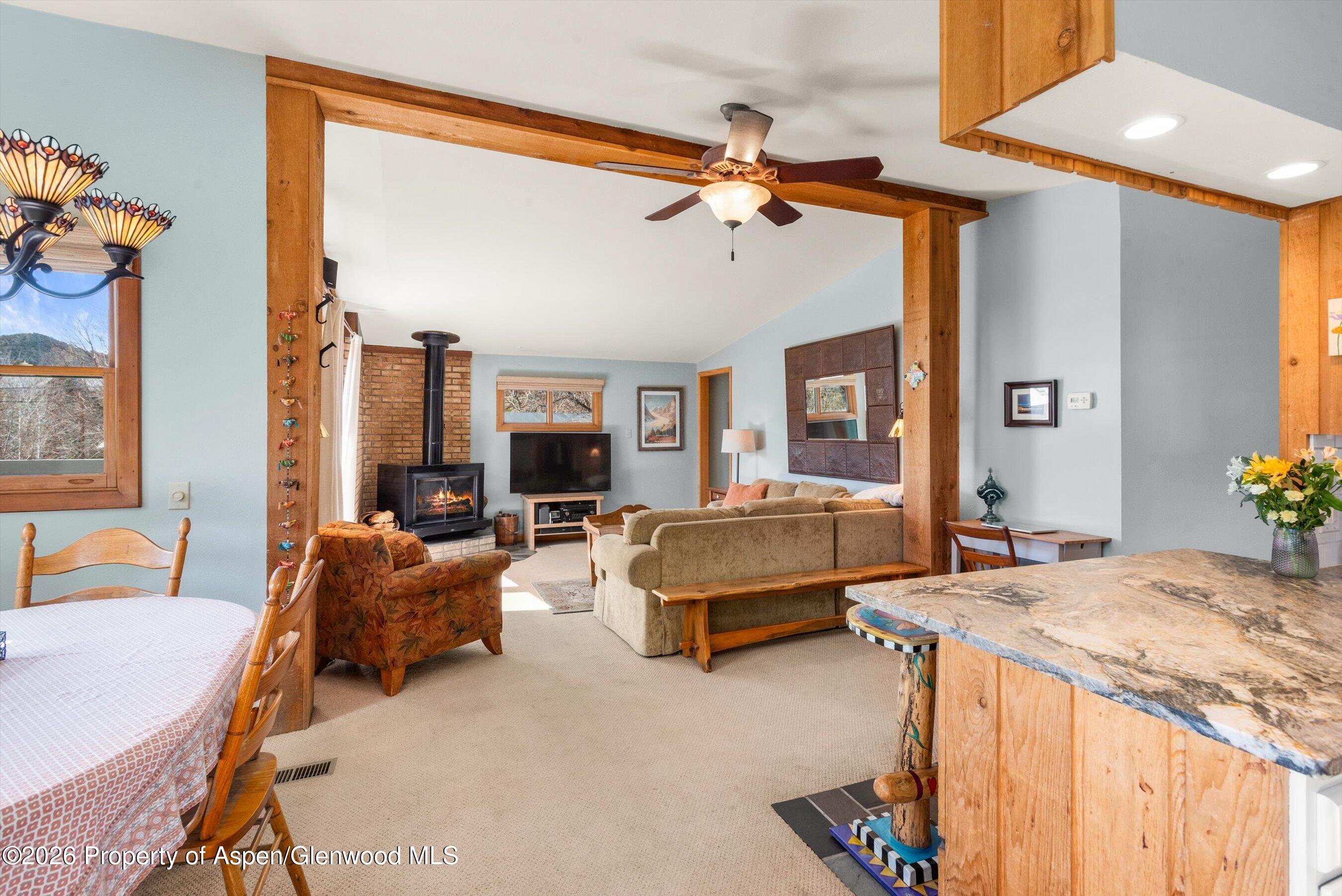 120 Tucker Lane Basalt, CO 81621 - Photo 16 of 33 a living room with furniture and a chandelier