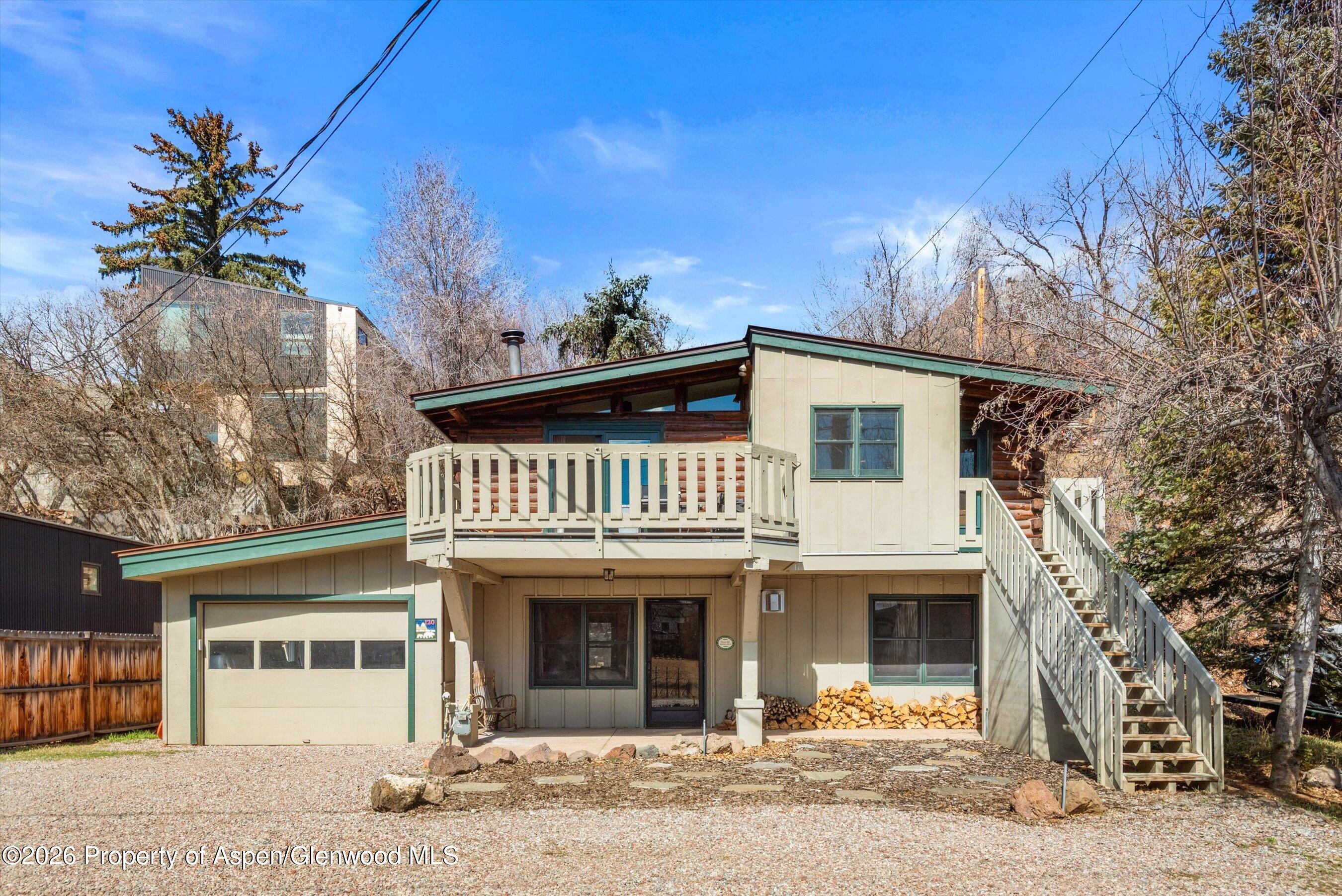 120 Tucker Lane Basalt, CO 81621 - Photo 28 of 33 a front view of a house with a garden
