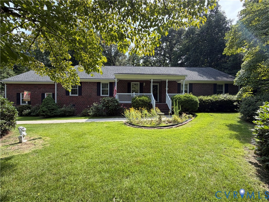 3933 Dunraven Road North Chesterfield, VA 23236 - Photo 1 of 30 a front view of house with yard and green space