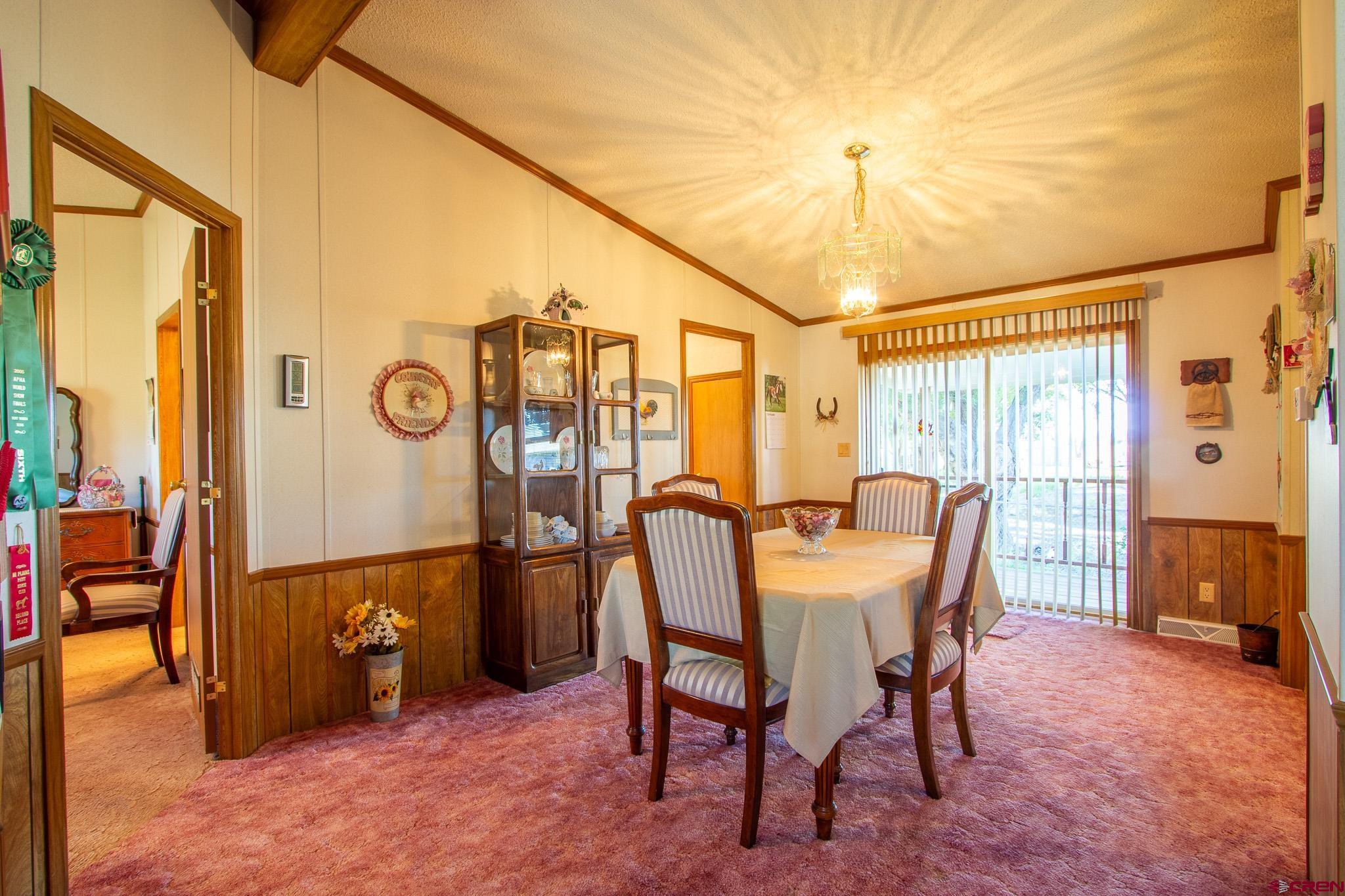 13648 B Road Delta, CO 81416 - Photo 13 of 35 a view of a dining room with furniture window and outside view