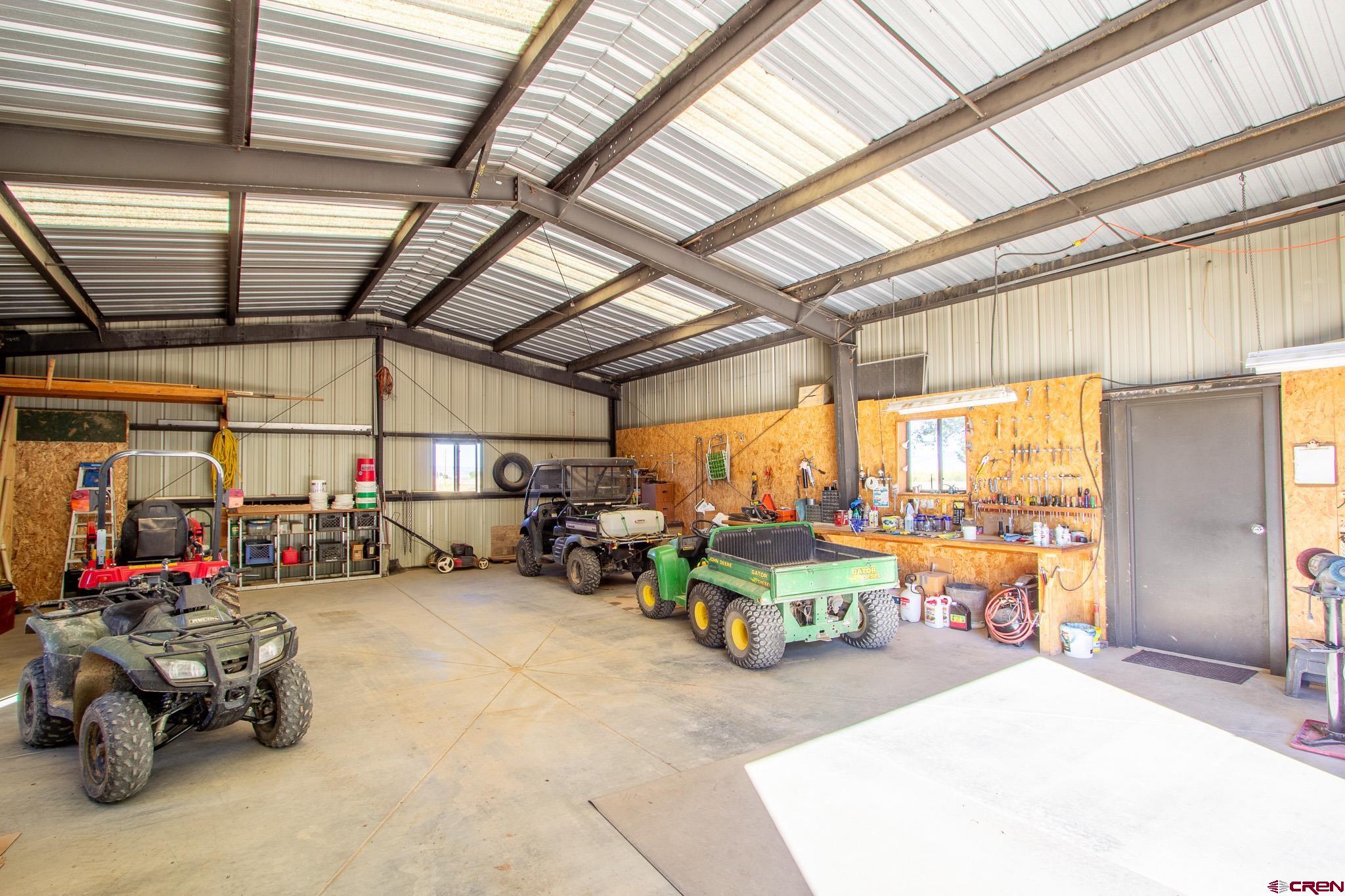 13648 B Road Delta, CO 81416 - Photo 34 of 35 a view of a garage with furniture