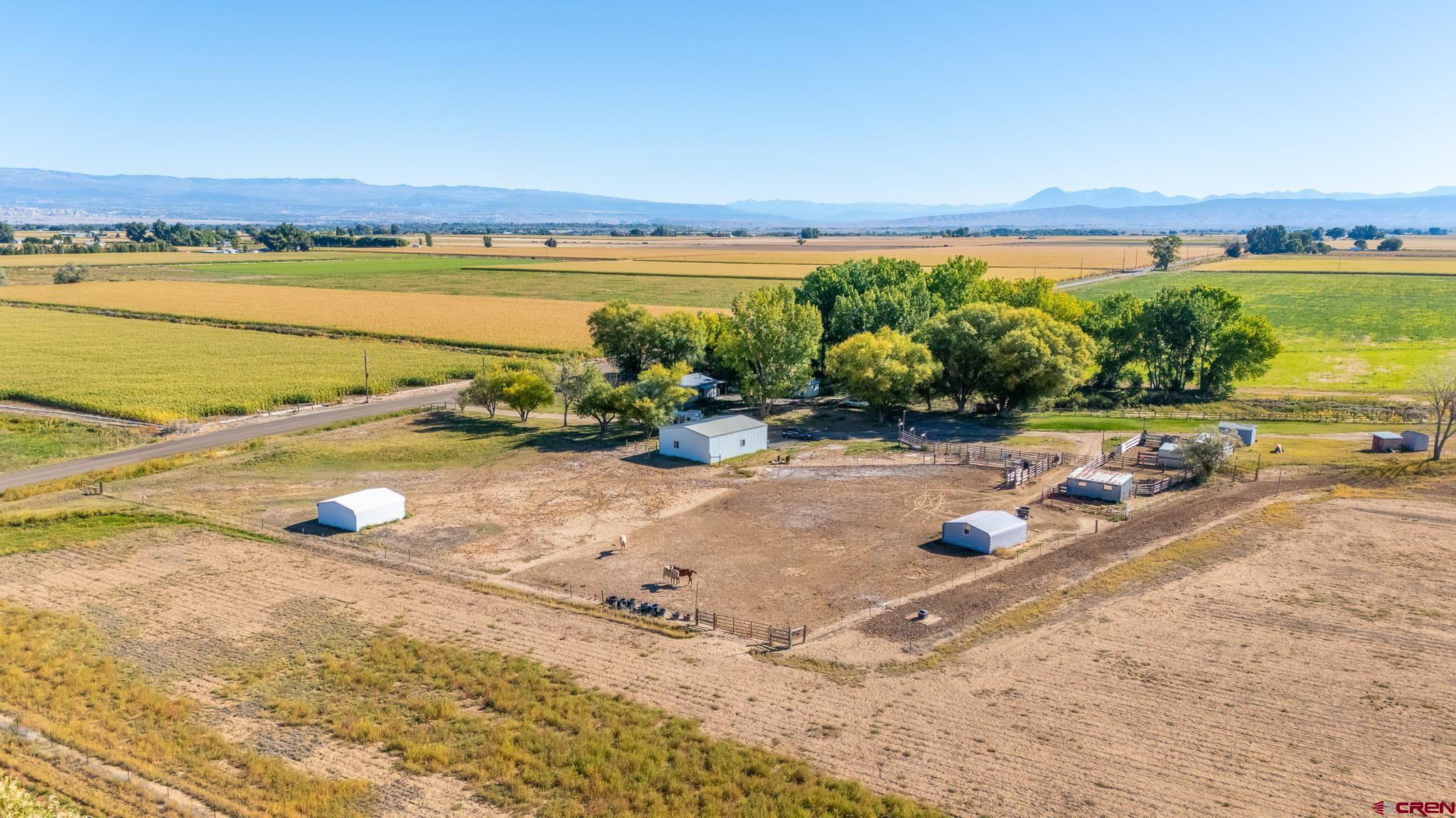 13648 B Road Delta, CO 81416 - Photo 5 of 35 a view of a lake with a mountain
