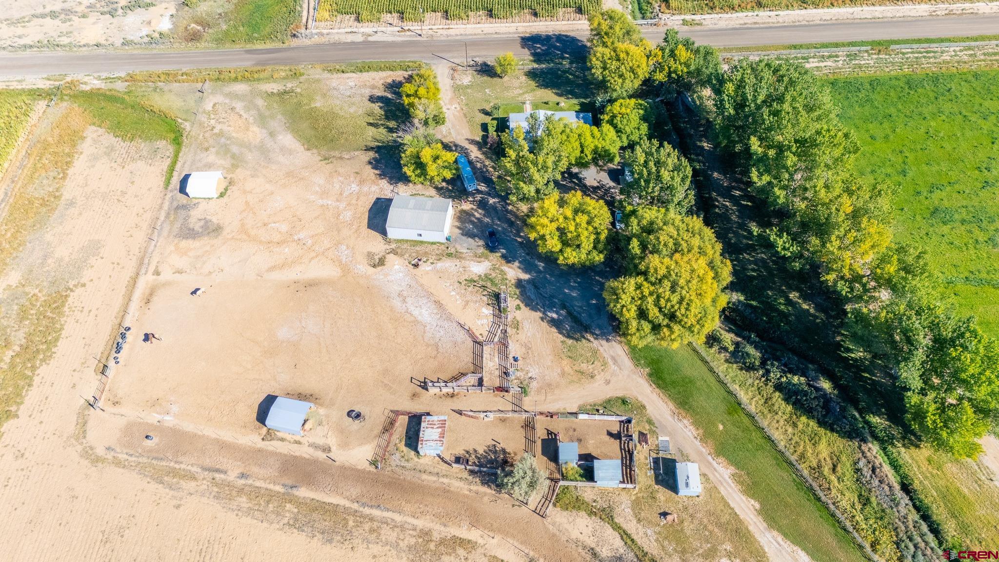 13648 B Road Delta, CO 81416 - Photo 7 of 35 a view of a swimming pool with a yard