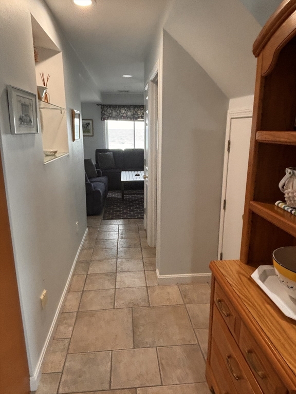 20 Humarock Beach, Unit 1 Scituate, MA 02066 - Photo 8 of 20 a room with storage and utility