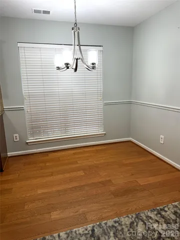 a view of a room with an empty space