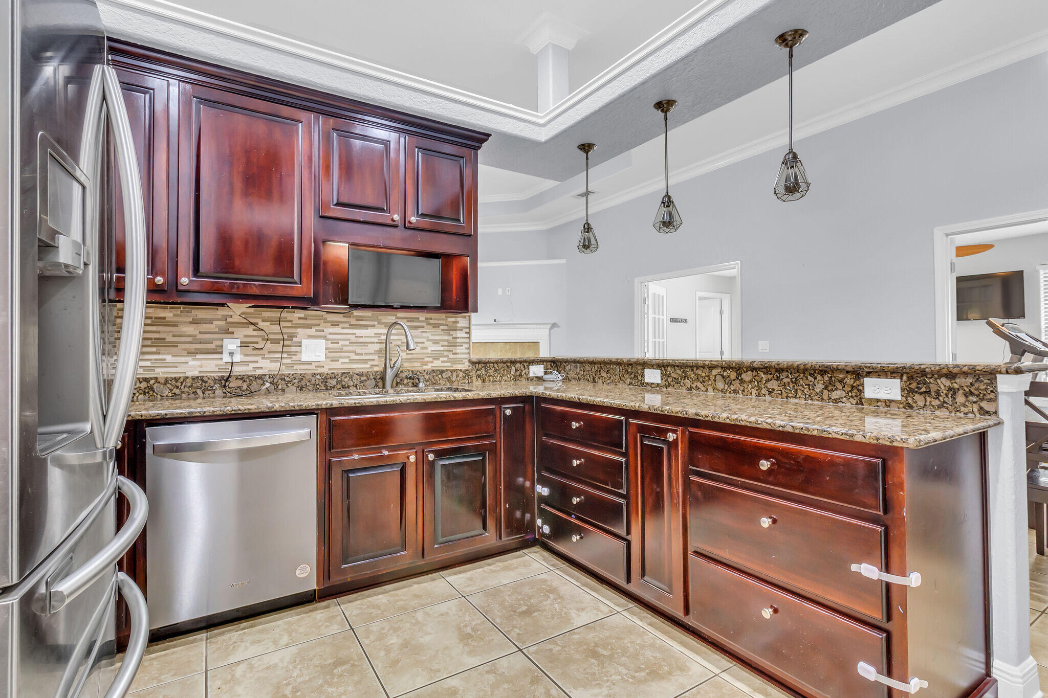 6181 Hummingbird Lane Crestview, FL 32536 - Photo 19 of 46 a kitchen with a sink stove and cabinets