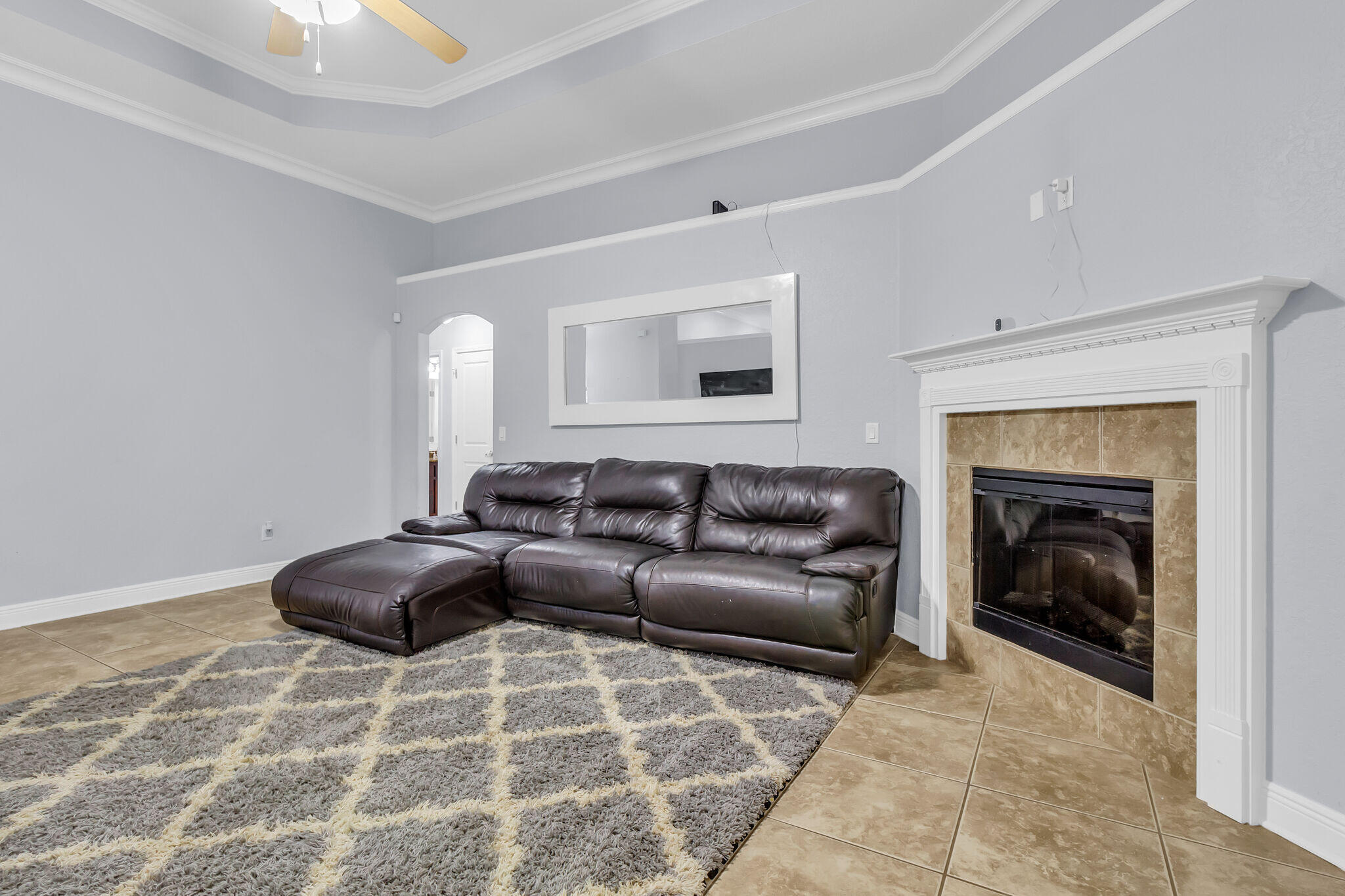 6181 Hummingbird Lane Crestview, FL 32536 - Photo 21 of 46 a living room with furniture and a fireplace