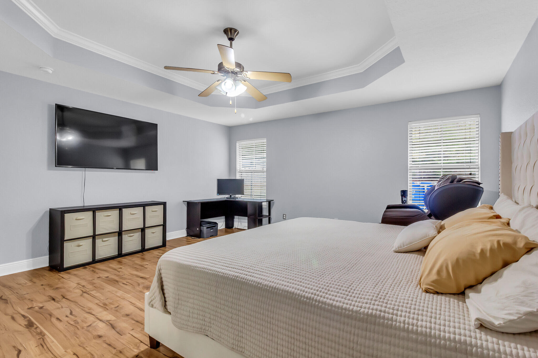 6181 Hummingbird Lane Crestview, FL 32536 - Photo 27 of 46 a bedroom with a bed and a flat screen tv