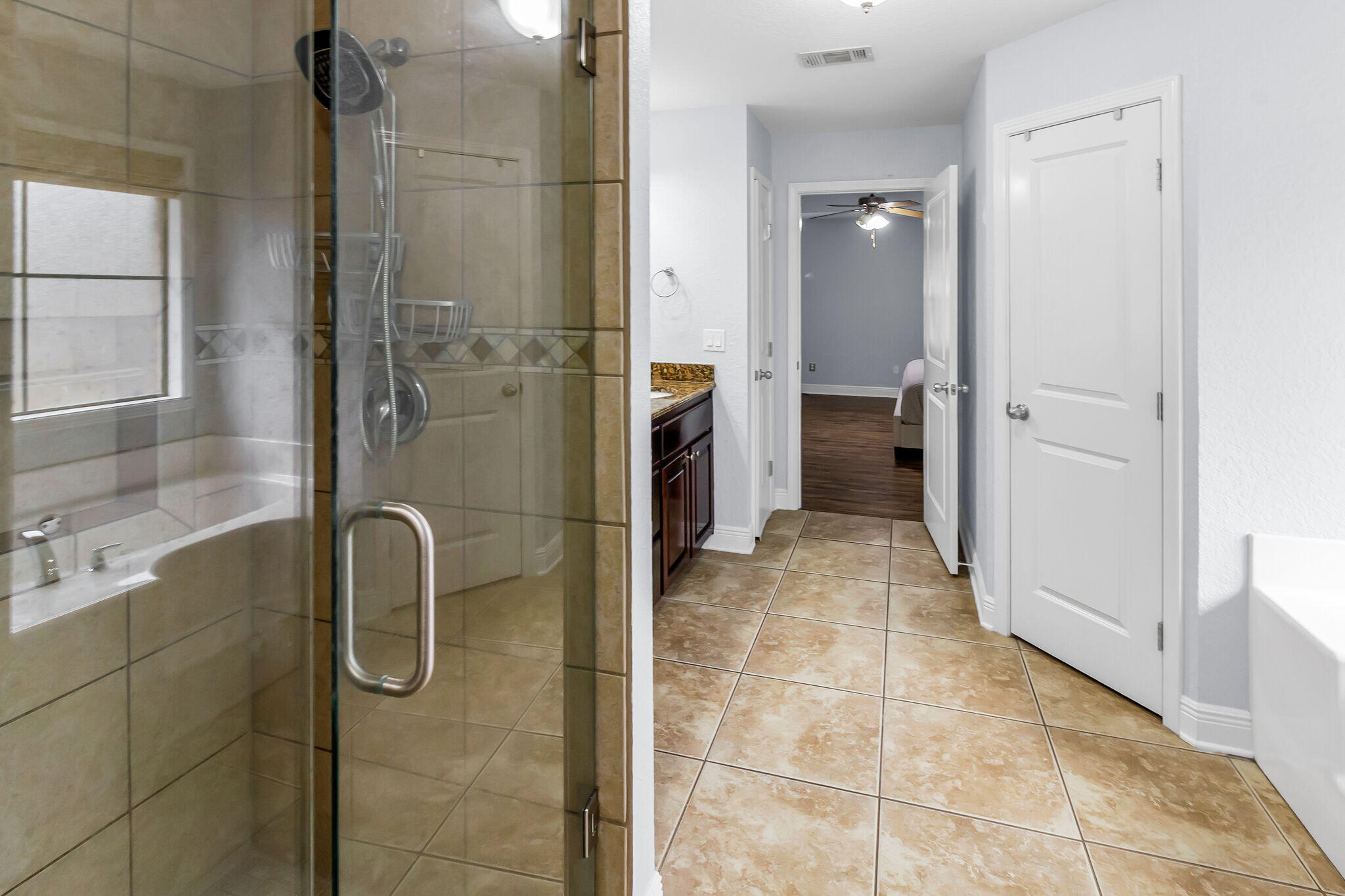 6181 Hummingbird Lane Crestview, FL 32536 - Photo 32 of 46 a bathroom with a shower and a sink