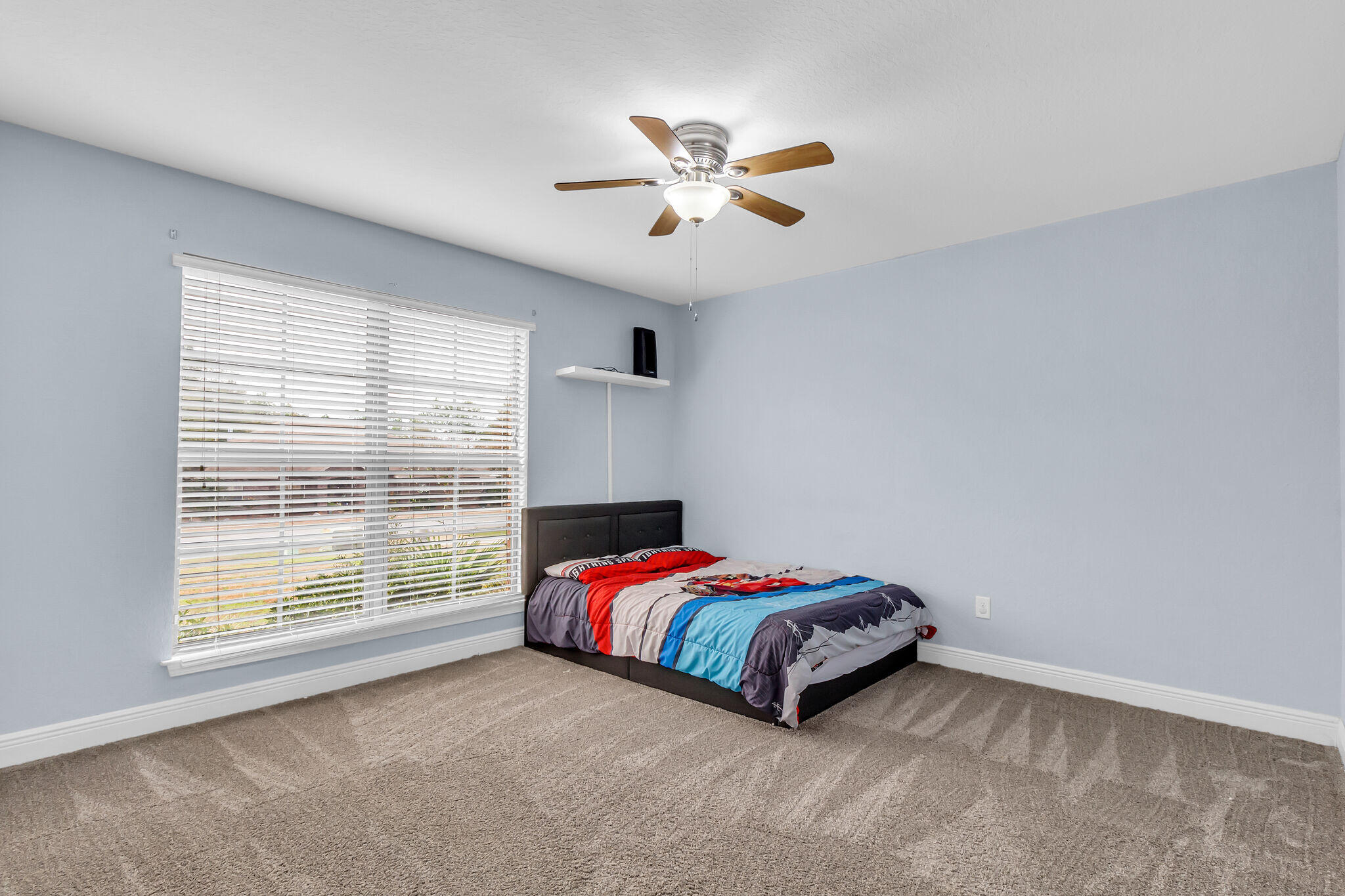 6181 Hummingbird Lane Crestview, FL 32536 - Photo 33 of 46 a bedroom with a bed and a window