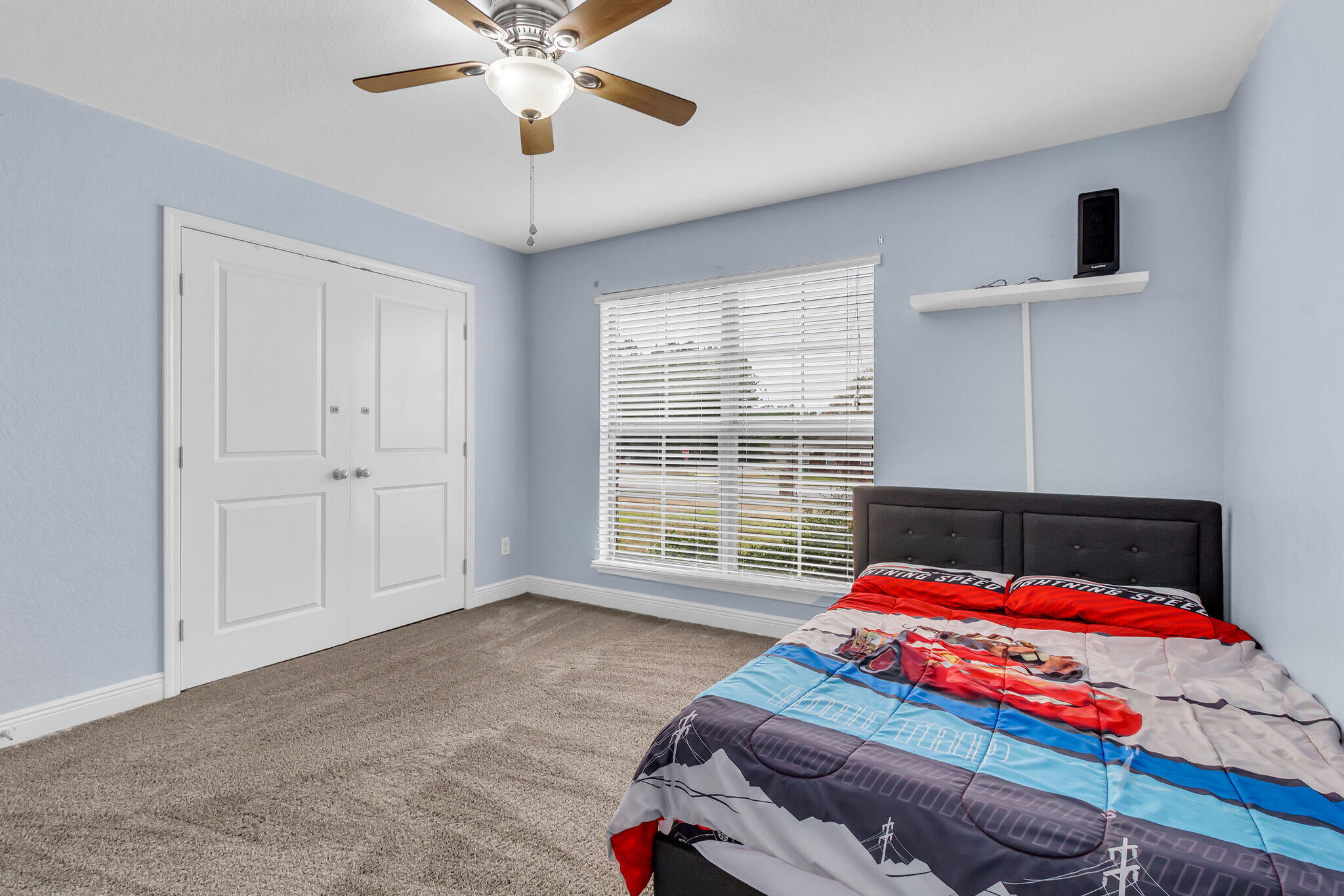 6181 Hummingbird Lane Crestview, FL 32536 - Photo 35 of 46 a bedroom with a bed and window