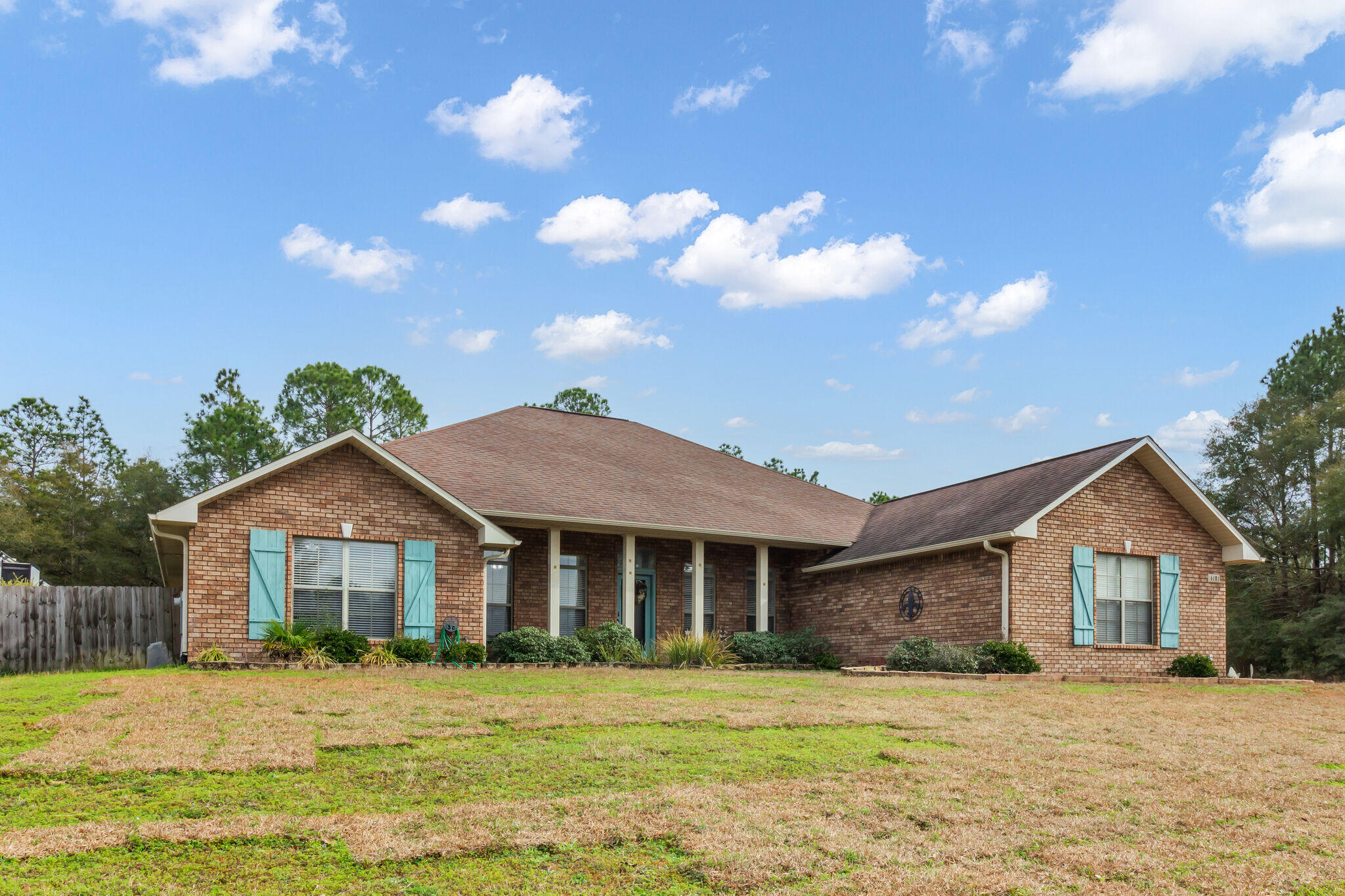 6181 Hummingbird Lane Crestview, FL 32536 - Photo 5 of 46 a front view of a house with a yard