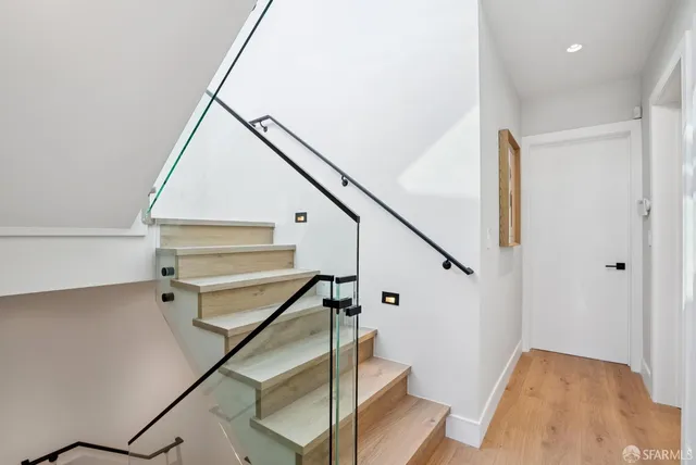 a view of entryway with wooden floor