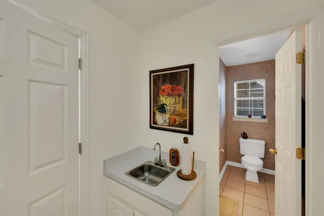 a bathroom with a sink and a toilet