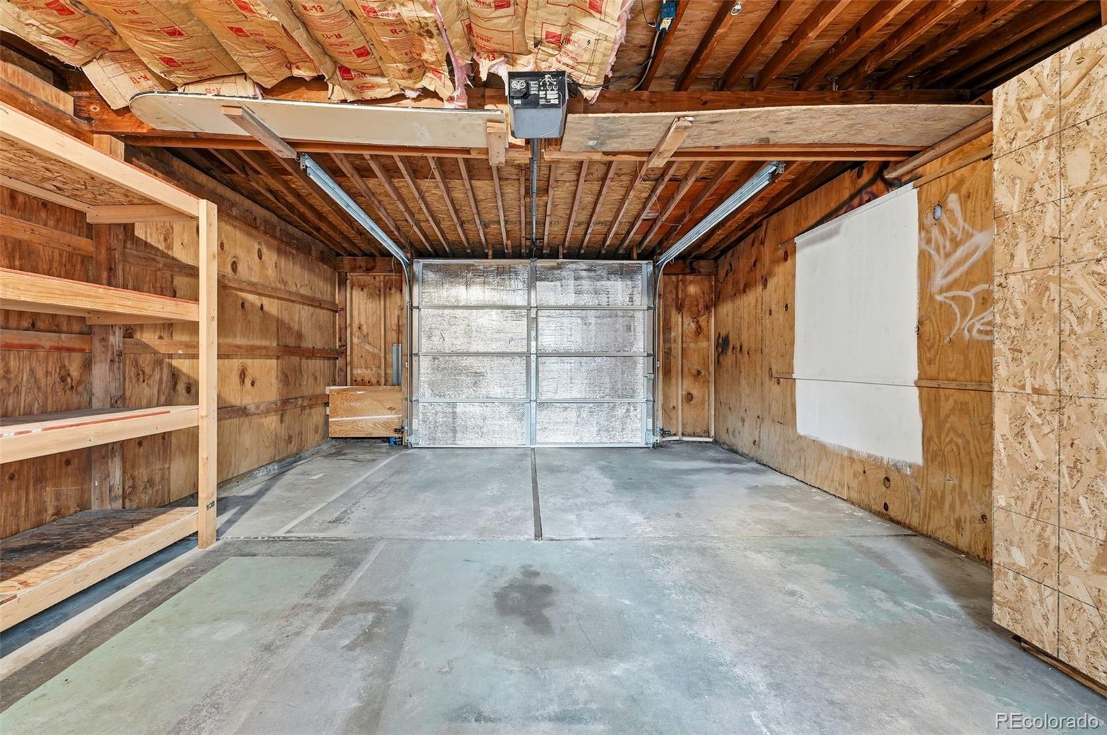 664 Meade Street Denver, CO 80204 - Photo 23 of 32 a view of an empty room with a garage
