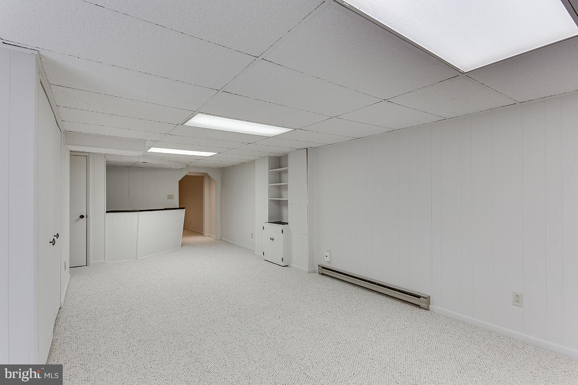 8228 Lakenheath Way Potomac, MD 20854 - Photo 28 of 41 a view of an empty room