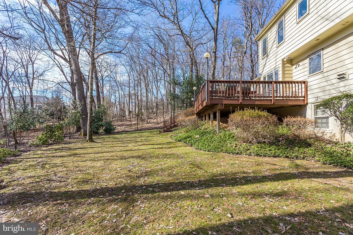 8228 Lakenheath Way Potomac, MD 20854 - Photo 40 of 41 a view of a house with a yard