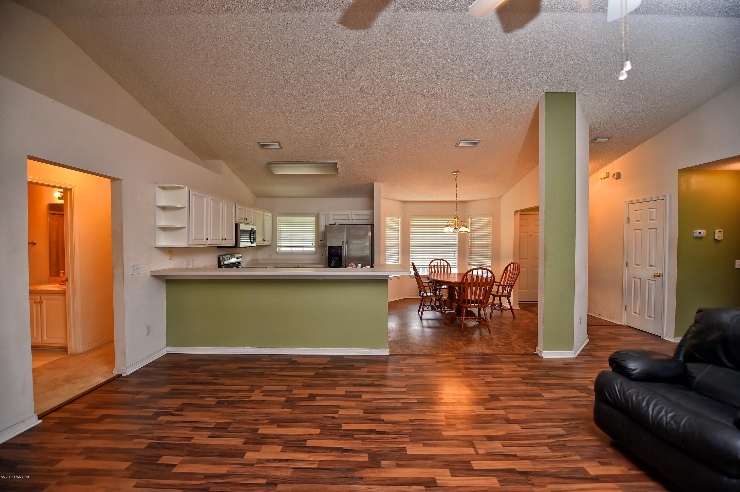 10370 Clayton Mill Road Jacksonville, FL 32221 - Photo 24 of 24 a view of kitchen with sink and dining area