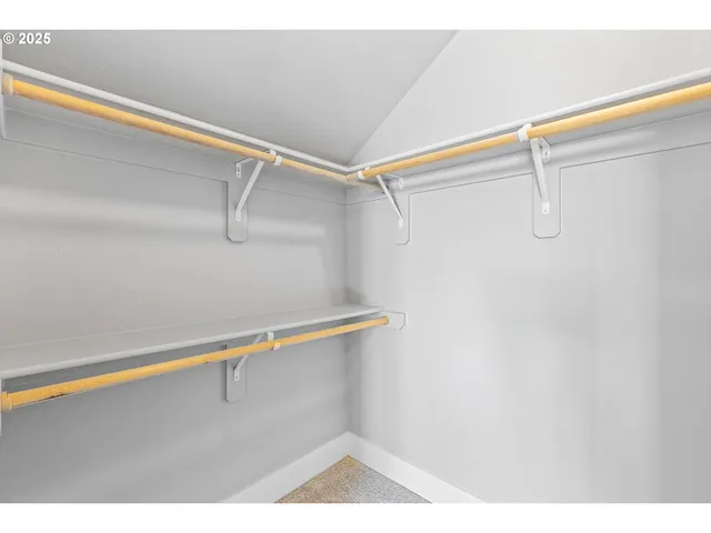 a picture of a room with racks on the wall
