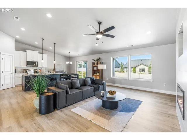 a living room with furniture and a window