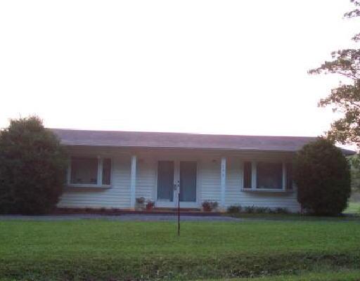 790 Bethany Road Callaway, VA 24067 - Photo 1 of 1 a front view of a house with a garden