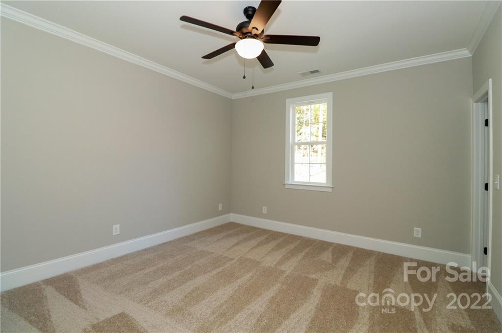 289 Ikerd Drive Southeast Concord, NC 28025 - Photo 16 of 24 a view of an empty room with a window