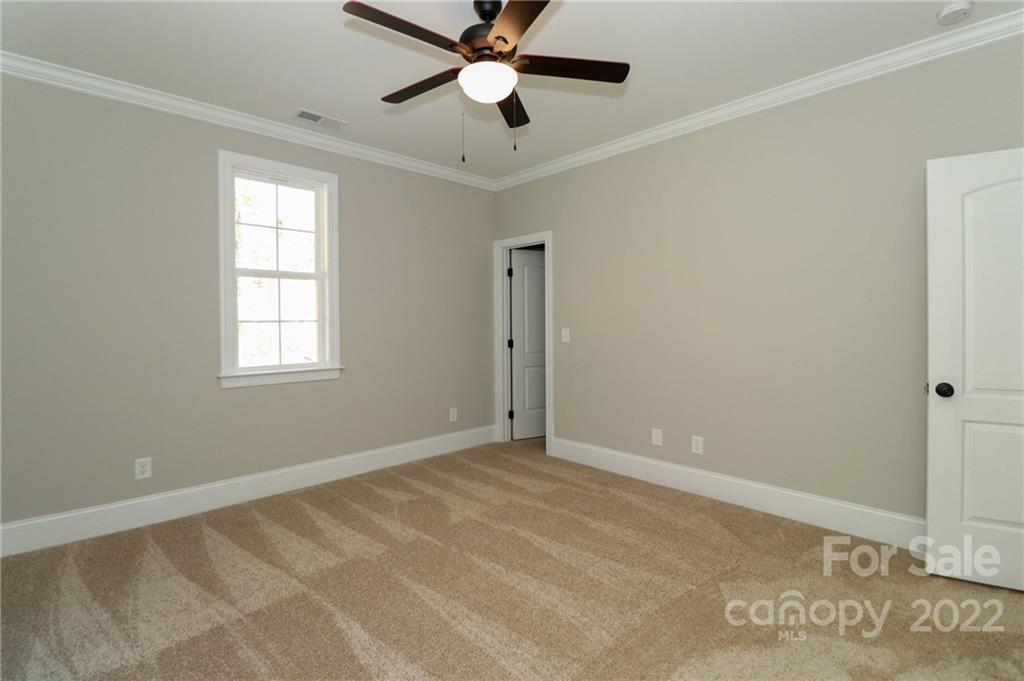 289 Ikerd Drive Southeast Concord, NC 28025 - Photo 17 of 24 a view of an empty room with a window