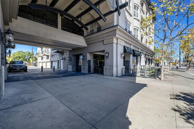 a view of a building with a glass door