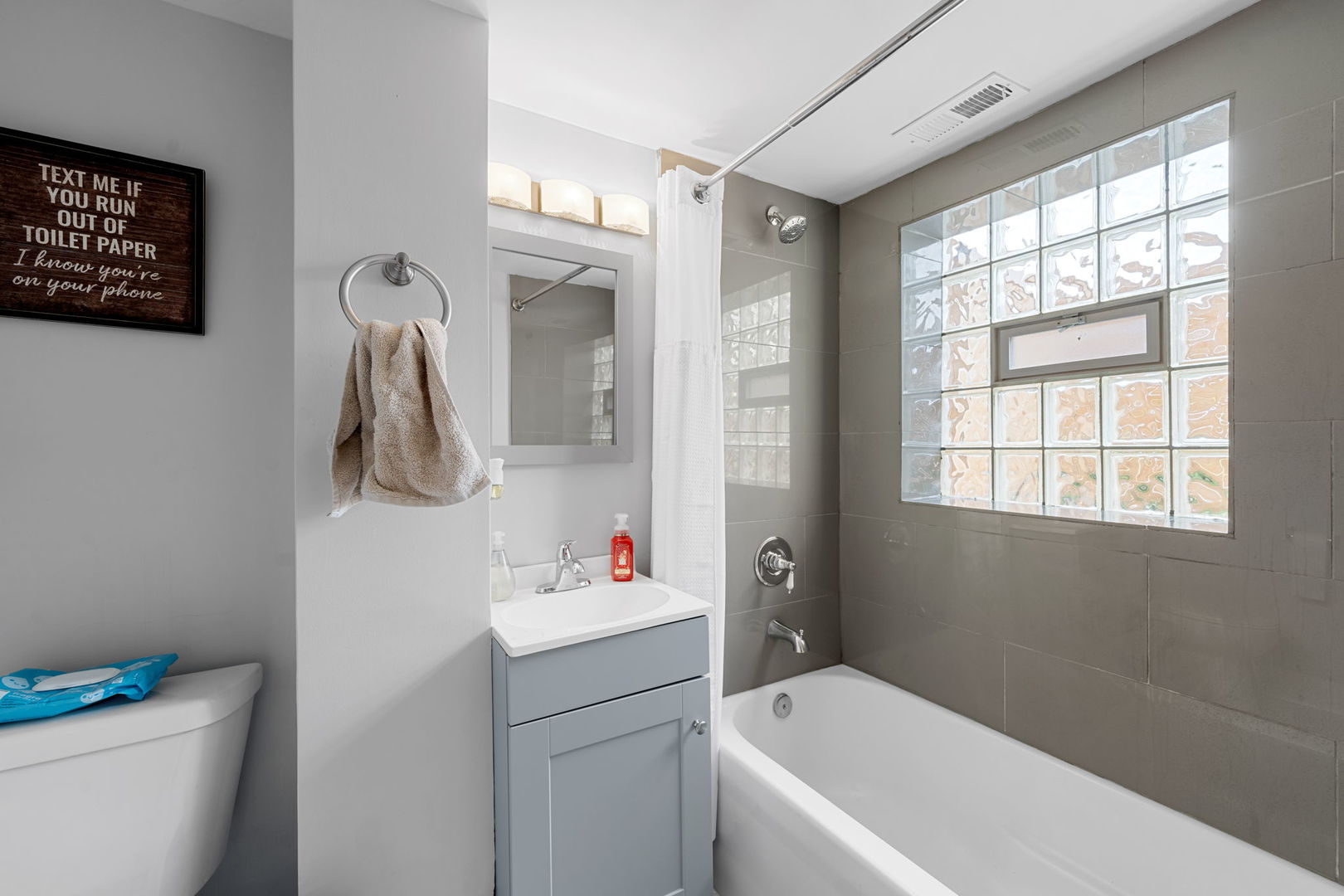 2256 18th Avenue North Riverside, IL 60546 - Photo 23 of 33 a bathroom with a sink toilet and window